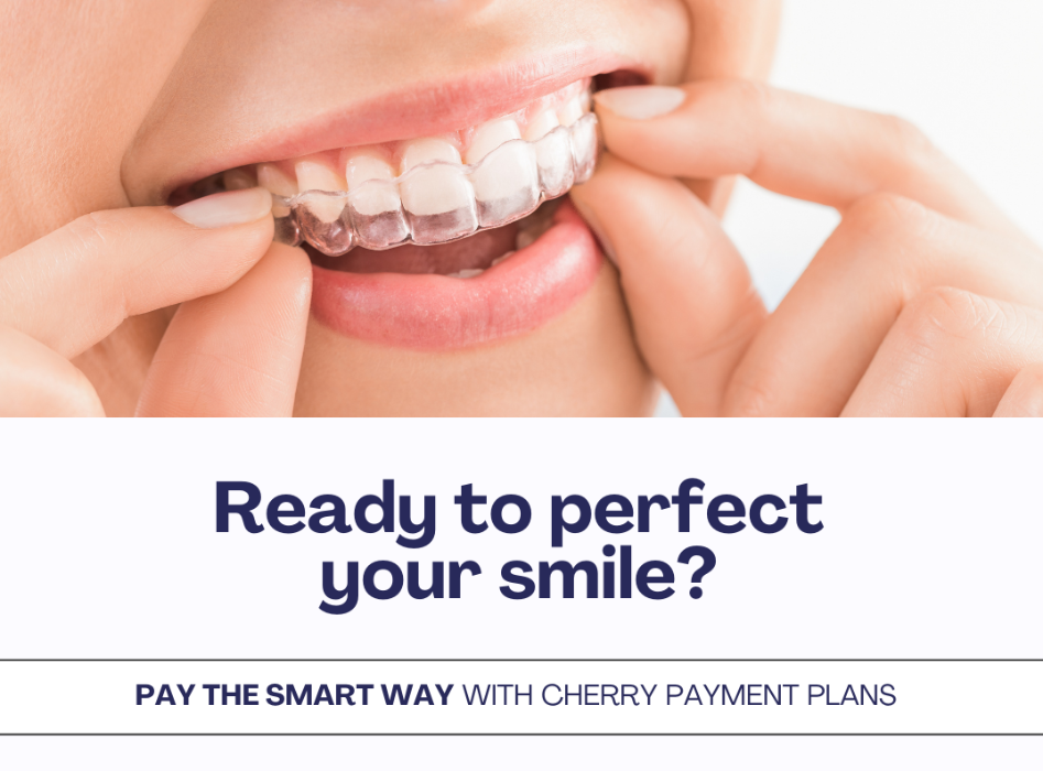 patient putting in clear plastic aligner | clear aligners high point nc